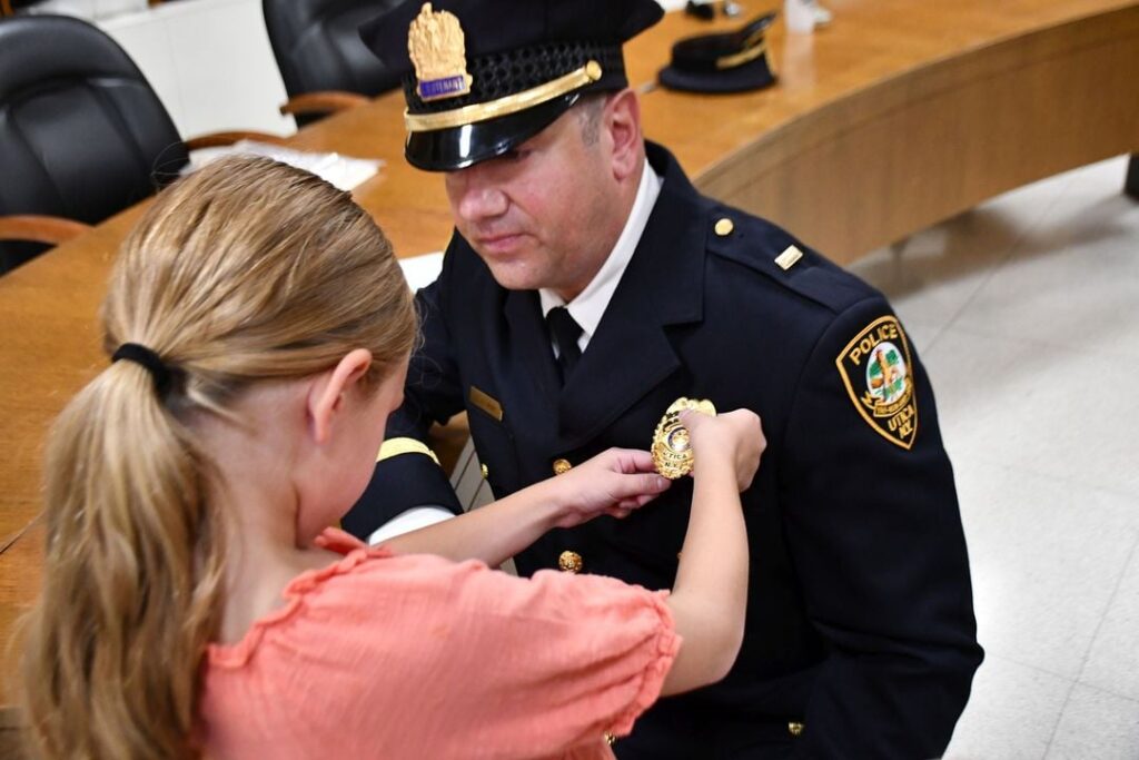 utica-police-department-promotes-three-officers-at-public-meeting